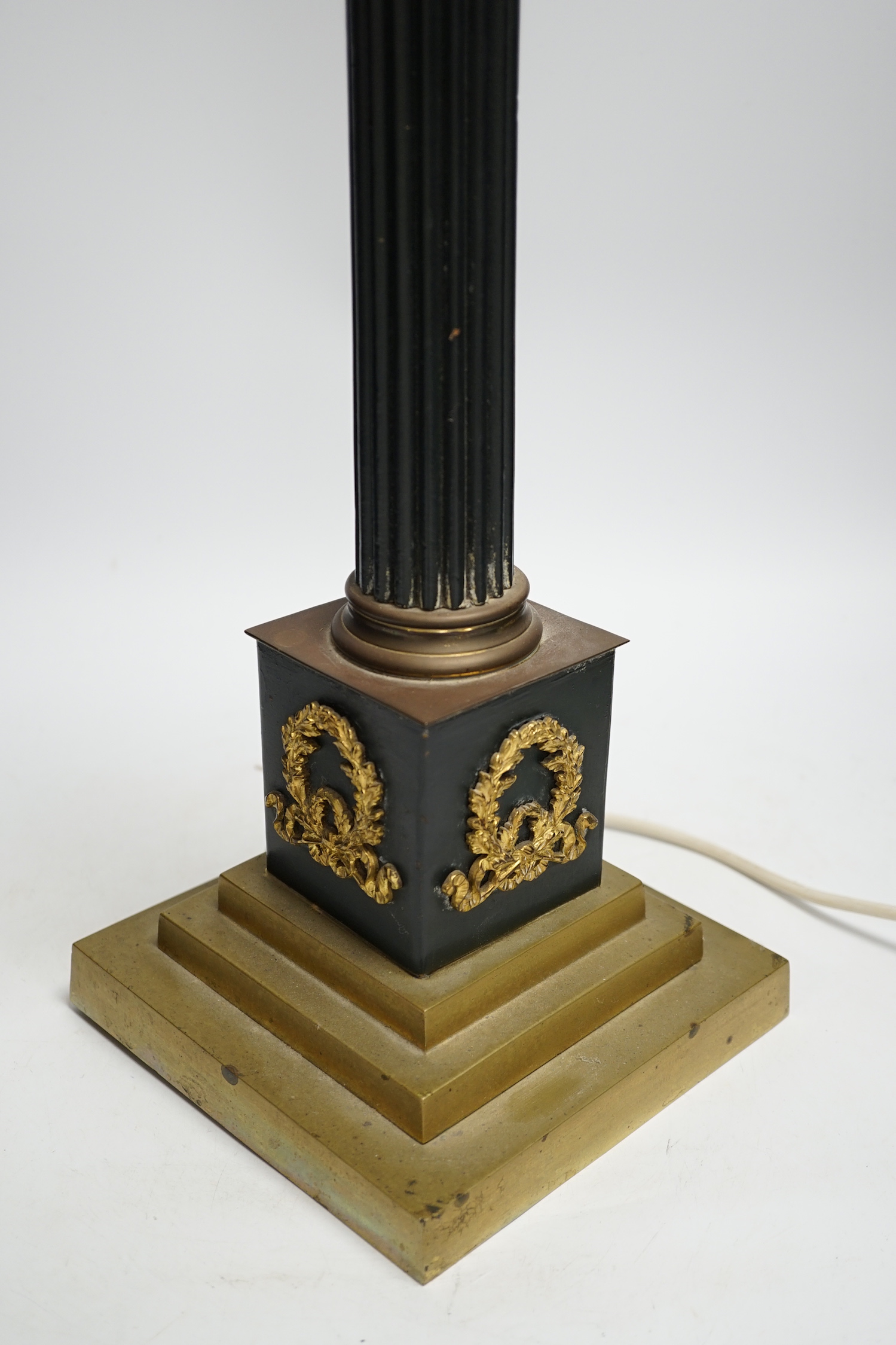 A Corinthian column desk lamp, with laurel wreath panels to base, 56cm